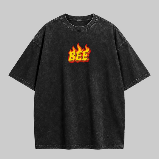 Front view of the black BEE FIRE T-shirt, featuring the Killer Bee design emblem.